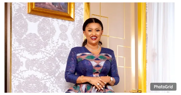 McBrown's US Travel Ban: Elegant shot of Nana Ama McBrown posing confidently for the camera, dressed in a stylish outfit with a warm smile, exuding grace and poise.