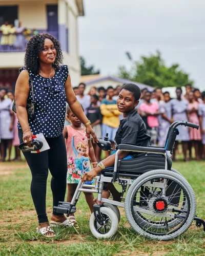 Priscilla and Mum in a beautifully posed photo in her new E-wheelchair