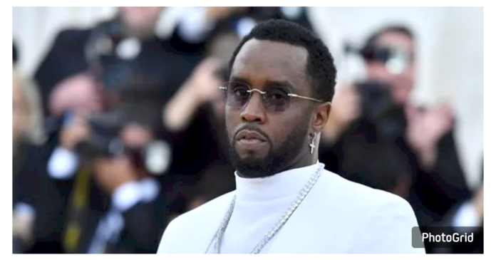 P Diddy Arrested : Captured on camera before his arrest in a black outfit with a tense expression.