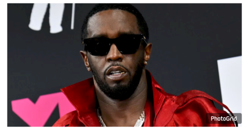 P Diddy seen prior to his arrest, wearing a burgundy outfit and dark sunglasses